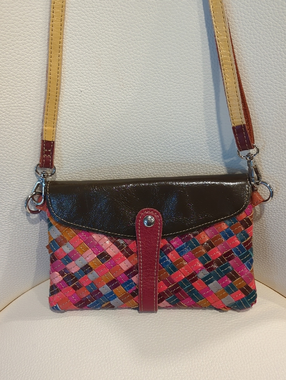 Multicolor Woven Leather Crossbody with Brown Flap and Pink Accent